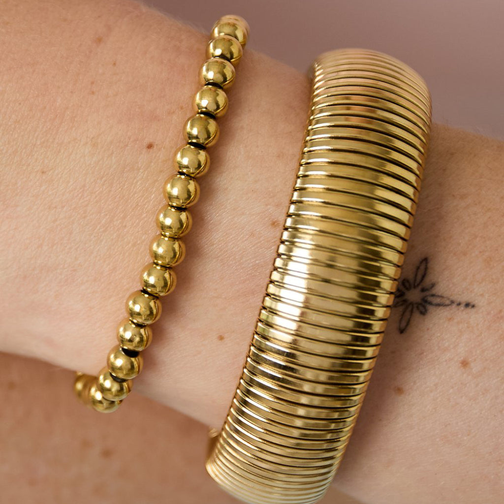 Bolletjes armband goud