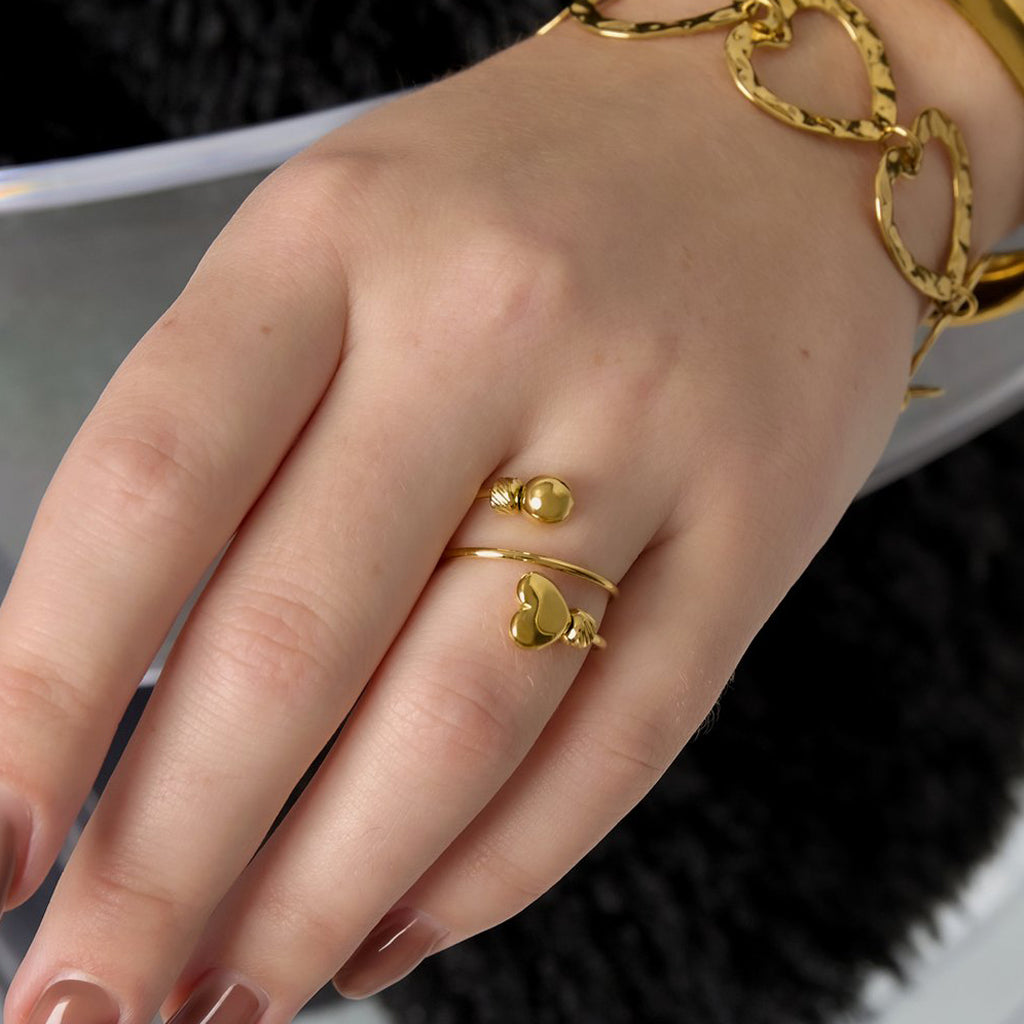 Twist love ring goud